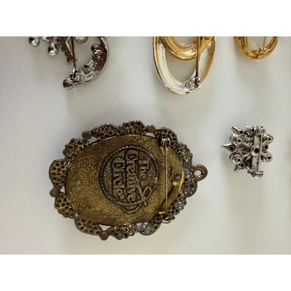 The Unbranded Brand brooch painted